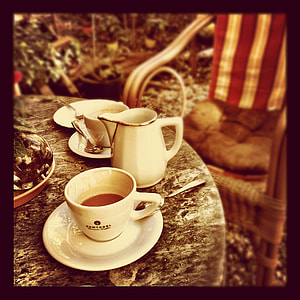 white ceramic tea set on top of gray marble table thumbnail