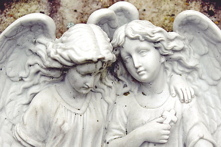 white ceramic angels statue thumbnail