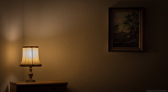 brown desk lamp on brown wooden side table thumbnail