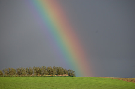rainbow under black skies thumbnail
