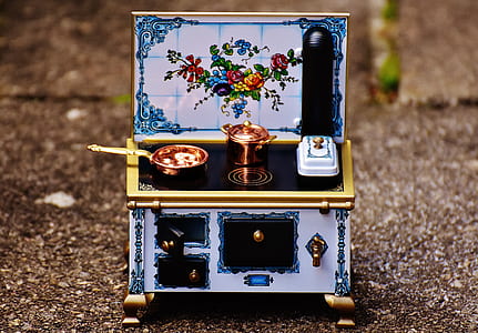 selective focus photography of miniature kitchen playset thumbnail