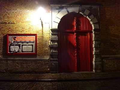 closed red wooden door thumbnail