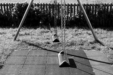 grayscale photography of outdoor swing thumbnail