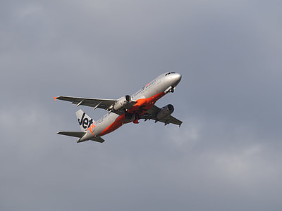 black and red commercial airplane thumbnail