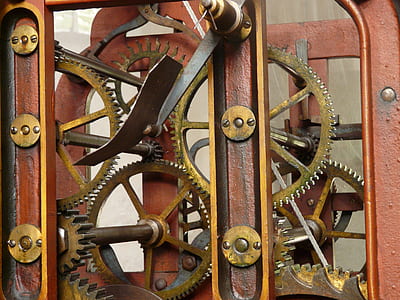 close-up photography of brown mechanical gears thumbnail