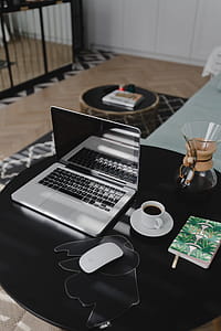 Workplace with laptop on table at home thumbnail