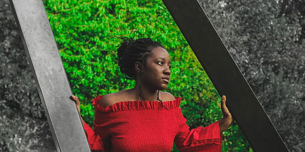 woman in red off-shoulder trumpet-sleeved top thumbnail