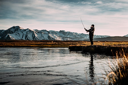 man fishing in lake thumbnail