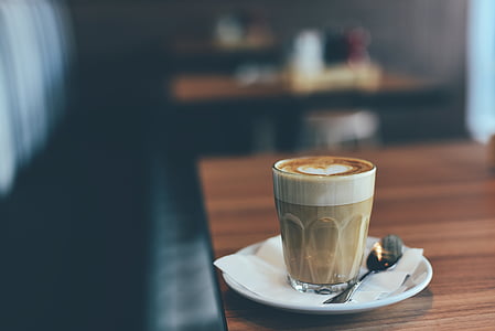 selective focus photography of drinking cup with cappuccino thumbnail