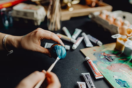 Woman Painting Easter Eggs thumbnail