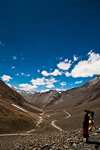 brown and gray mountain under white clouds thumbnail