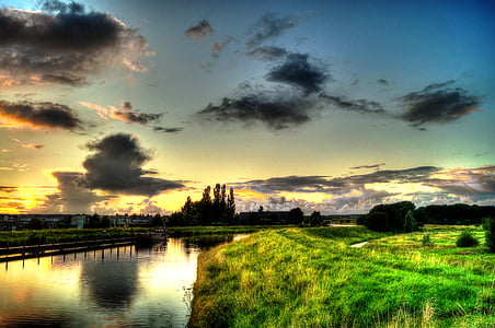 landscape photography of castle near body of water thumbnail