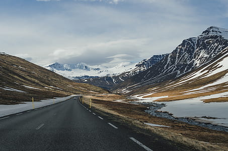 road beside mountain thumbnail