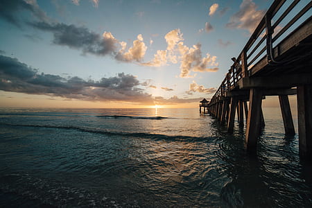 Scenic View of Sea Against Sky at Sunset thumbnail