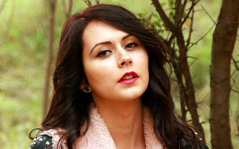 woman wearing pink and black jacket thumbnail