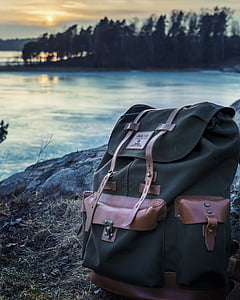 brown and black backpack thumbnail