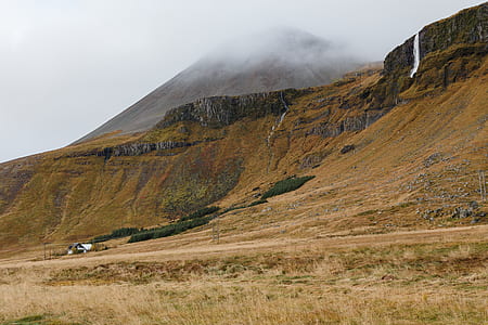 brown mountains during daytime thumbnail