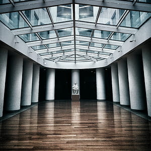 statue in the middle of columns indoor thumbnail