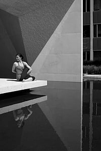 woman sitting down on platfrom thumbnail