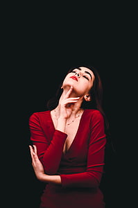 woman in red long-sleeved dress thumbnail
