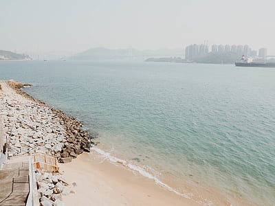 bricks on shoreline photograph thumbnail