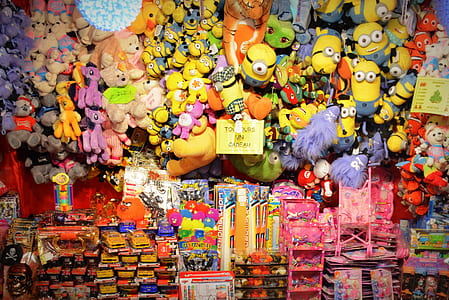 assorted plush toy lot on wall thumbnail