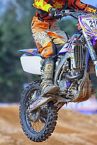 man riding motocross dirt bike thumbnail