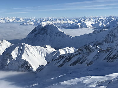 aerial view of snowy mountains thumbnail