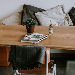 beer bottle on top of table thumbnail