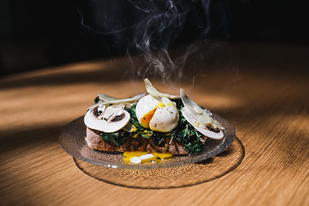 grilled meat topped with parsley, mushroom, and egg thumbnail