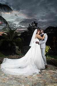 Photo of a Man Kissing His Wife thumbnail