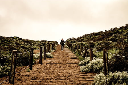 person walking on stairs outdoors thumbnail
