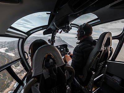 two person flying plane during daytime thumbnail