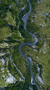 areal photo of road between rock formations thumbnail