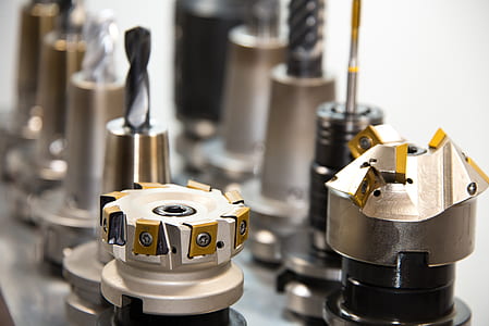 stainless steel tool bits on tilt shift lens photo thumbnail