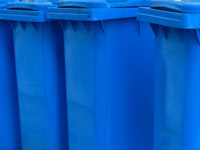 several blue plastic trash bins thumbnail