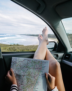 person holding map thumbnail