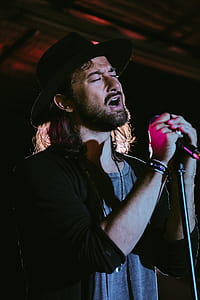man holding black microphone thumbnail