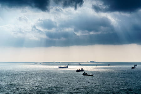 boats on body of water during daytime thumbnail