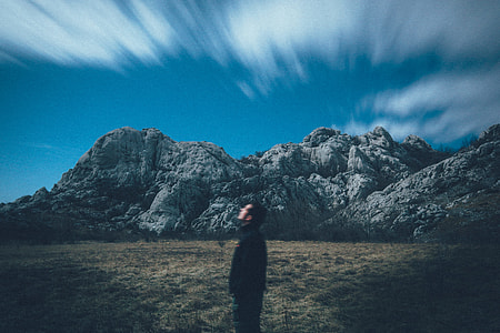 man standing on field thumbnail