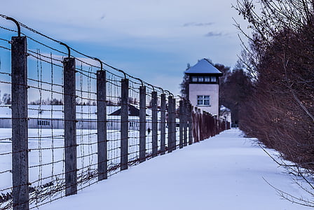 structure enclosed with fence covered in snow thumbnail