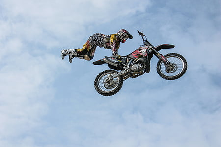 time lapse photography of man riding motorcycle thumbnail