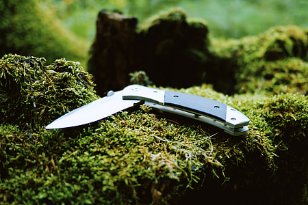 Folding Knife on a rock thumbnail