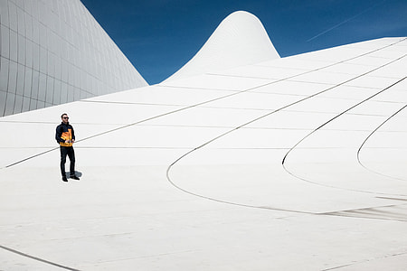 man standing on white slope thumbnail