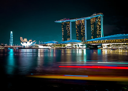 timelapse photography of city high-rise buildings during night time thumbnail