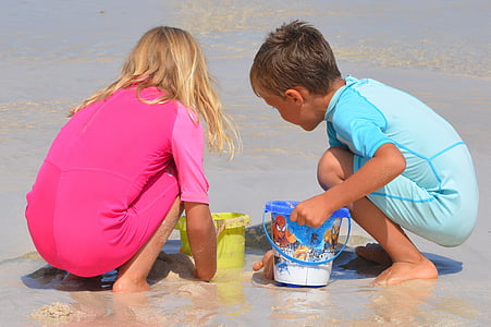 children playing near shore thumbnail