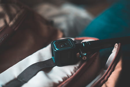 black camera on brown case thumbnail