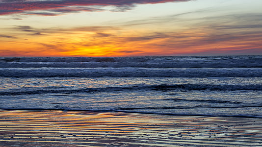 body of water under cloudy sky thumbnail