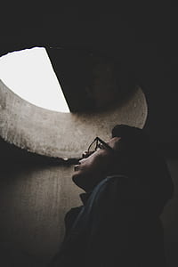 photography of man inside the manhole thumbnail