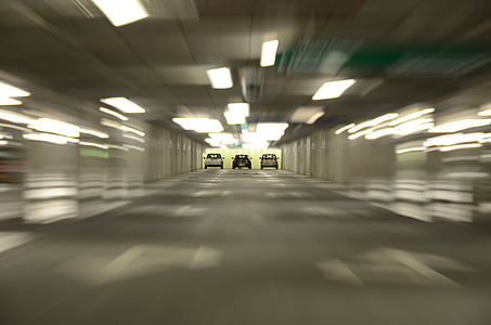 three cars under tunnel thumbnail